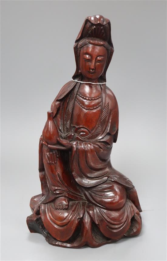 A Chinese carved hardwood figure of Guanyin height 33cm